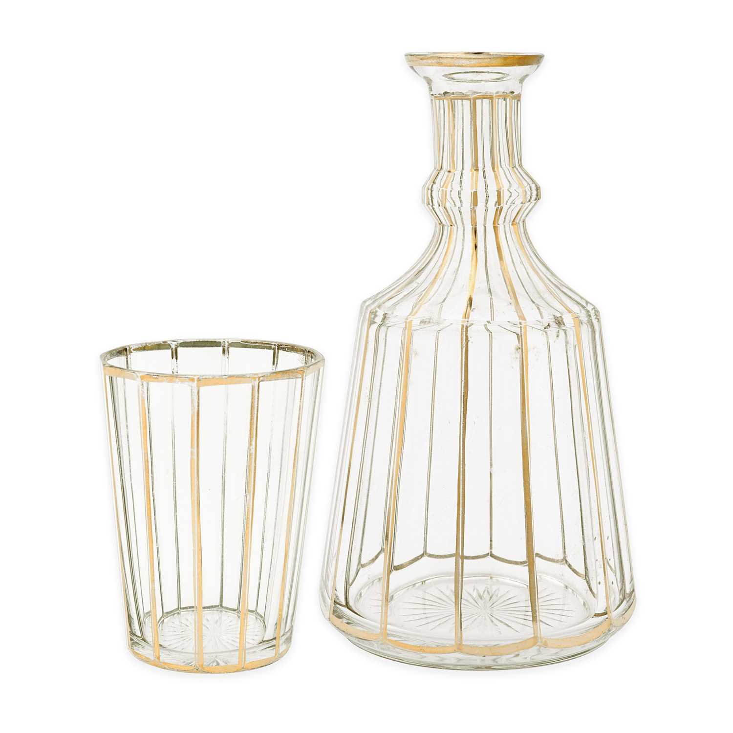 Lot 4 - An early 20th century gilded glass bottle with beaker.
