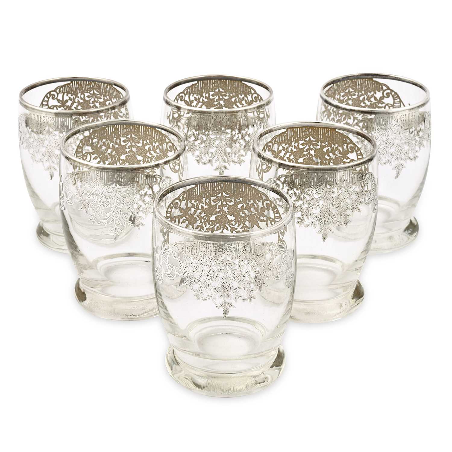 Lot 6 - A set of 6 first quarter 20th century drinking glasses gilded with silver.