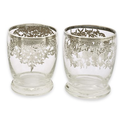 Lot 7 - A set of 8 first quarter 20th century drinking glasses gilded with silver.