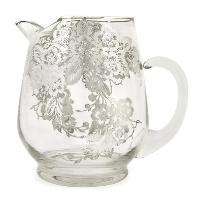 Lot 8 - An early 20th century antique jug inlaid with silver. Circa 1920.