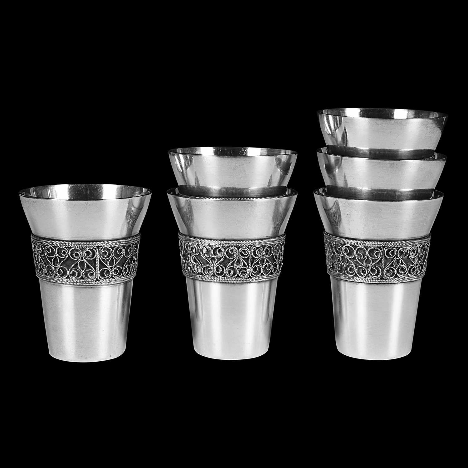 Lot 21 - A set of 1970's steel liquor cups.