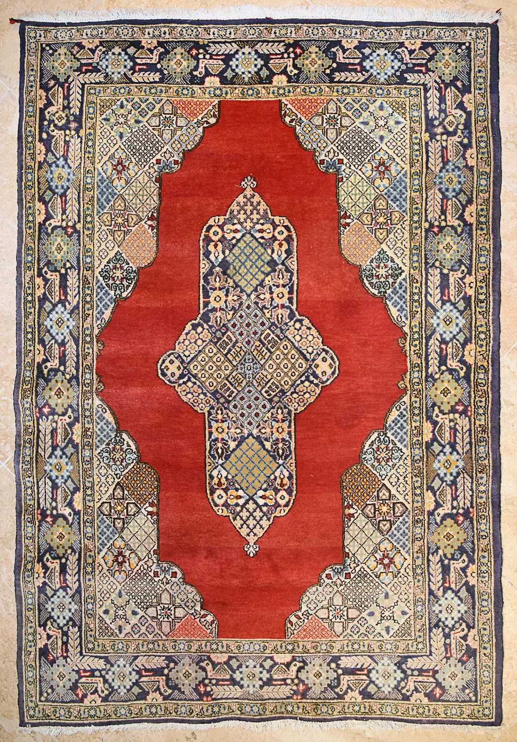 Lot 10 - Wool Qum carpet of geometrical and medallion design