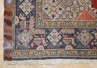 Lot 10 - Wool Qum carpet of geometrical and medallion design