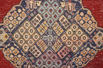 Lot 10 - Wool Qum carpet of geometrical and medallion design