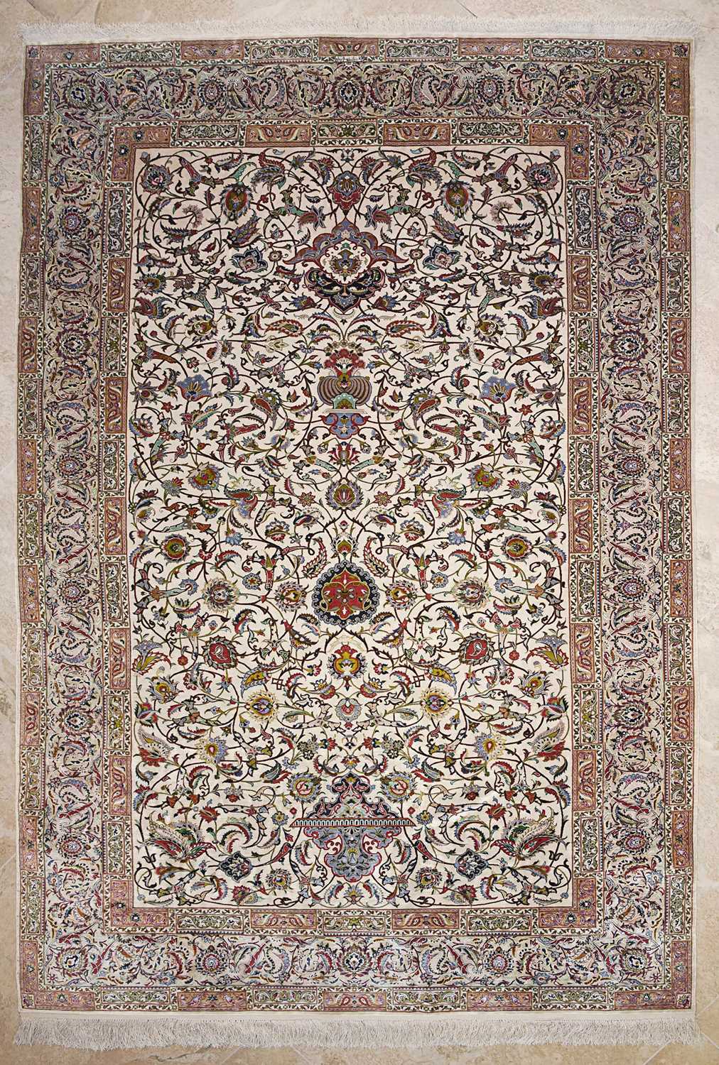 Lot 18 - Silk Isfahan carpet of floral designs