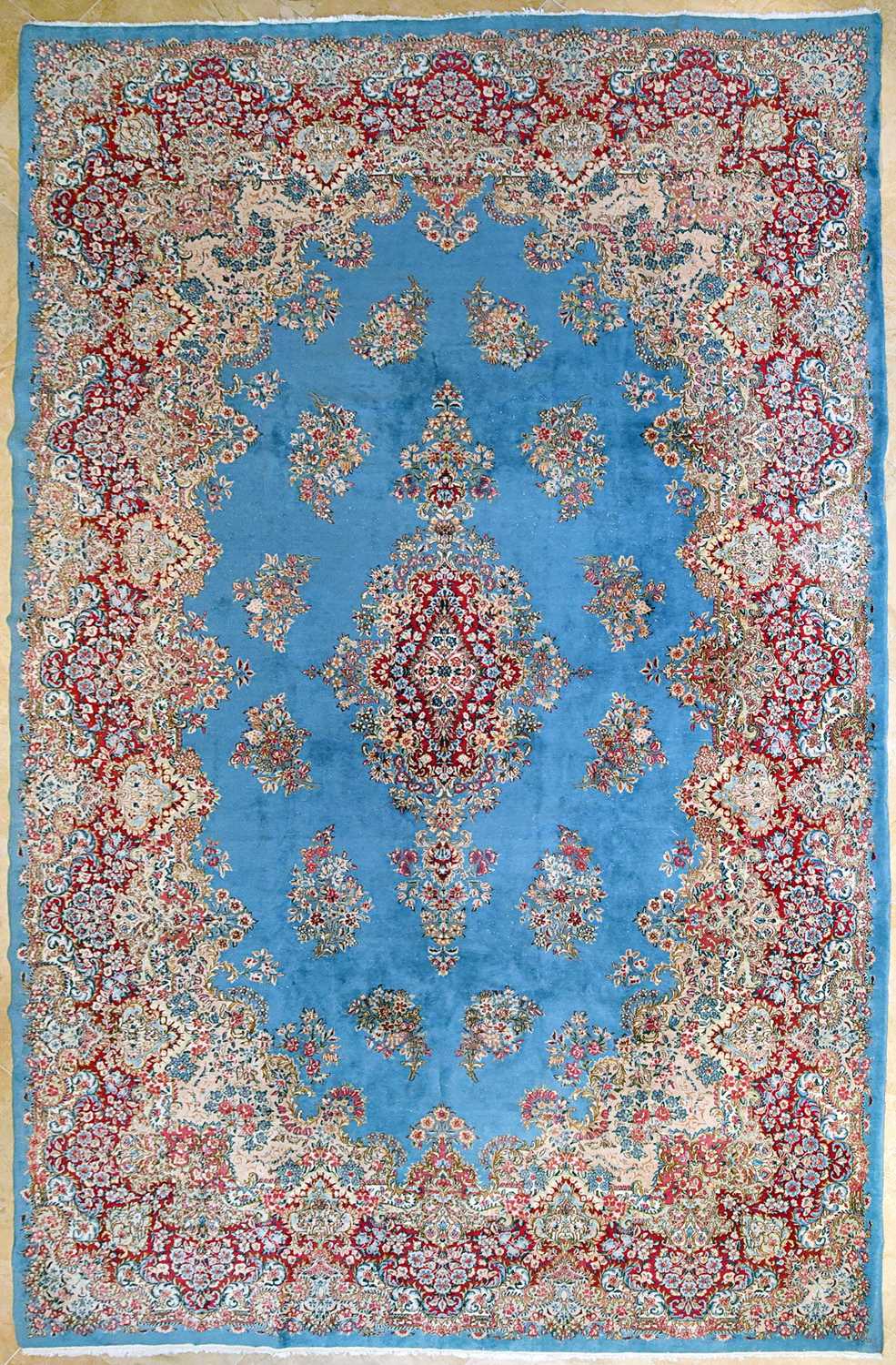 Lot 23 - Early 20th Century large French Kerman carpet with floral designs on turquoise background