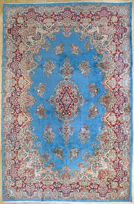 Lot 23 - Early 20th Century large French Kerman carpet with floral designs on turquoise background
