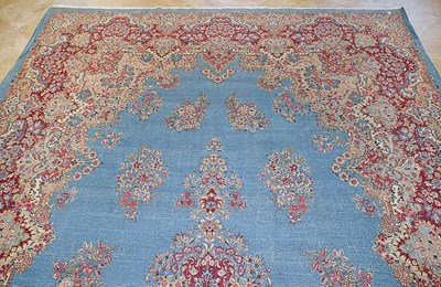 Lot 23 - Early 20th Century large French Kerman carpet with floral designs on turquoise background