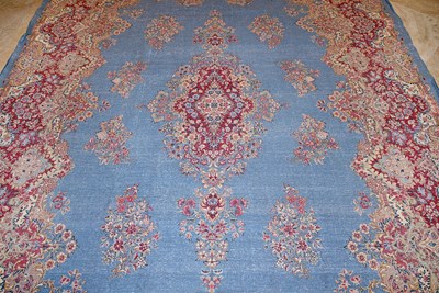Lot 23 - Early 20th Century large French Kerman carpet with floral designs on turquoise background