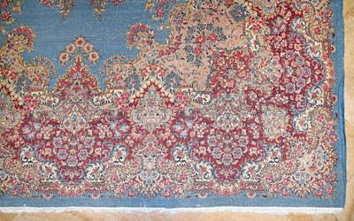 Lot 23 - Early 20th Century large French Kerman carpet with floral designs on turquoise background