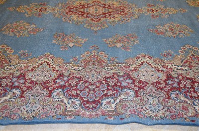 Lot 23 - Early 20th Century large French Kerman carpet with floral designs on turquoise background