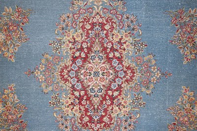 Lot 23 - Early 20th Century large French Kerman carpet with floral designs on turquoise background