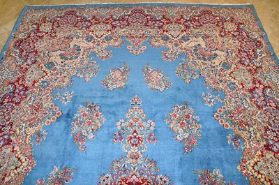 Lot 23 - Early 20th Century large French Kerman carpet with floral designs on turquoise background