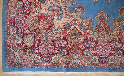 Lot 23 - Early 20th Century large French Kerman carpet with floral designs on turquoise background