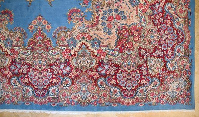 Lot 23 - Early 20th Century large French Kerman carpet with floral designs on turquoise background