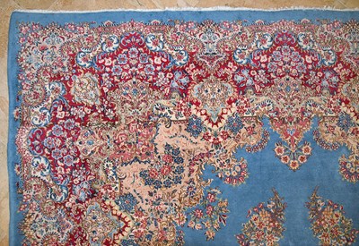 Lot 23 - Early 20th Century large French Kerman carpet with floral designs on turquoise background