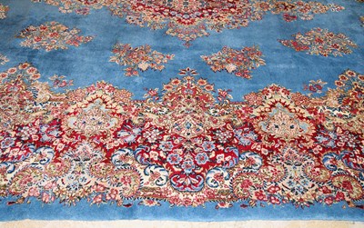 Lot 23 - Early 20th Century large French Kerman carpet with floral designs on turquoise background