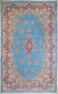 Lot 23 - Early 20th Century large French Kerman carpet with floral designs on turquoise background