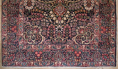 Lot 48 - Early 20th Century wool on cotton pair of Thousand Flowers Kerman carpet