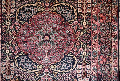 Lot 48 - Early 20th Century wool on cotton pair of Thousand Flowers Kerman carpet