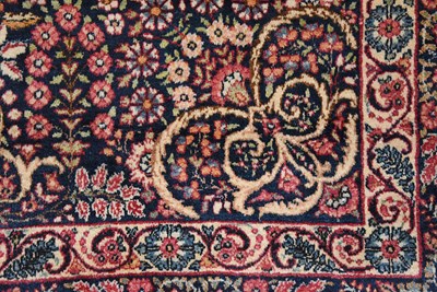 Lot 48 - Early 20th Century wool on cotton pair of Thousand Flowers Kerman carpet