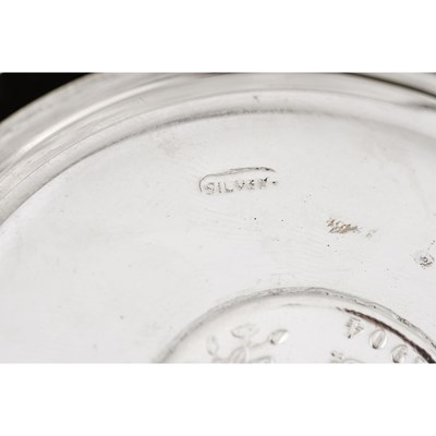 Lot 8 - A boxed set of six Indian silver plates.