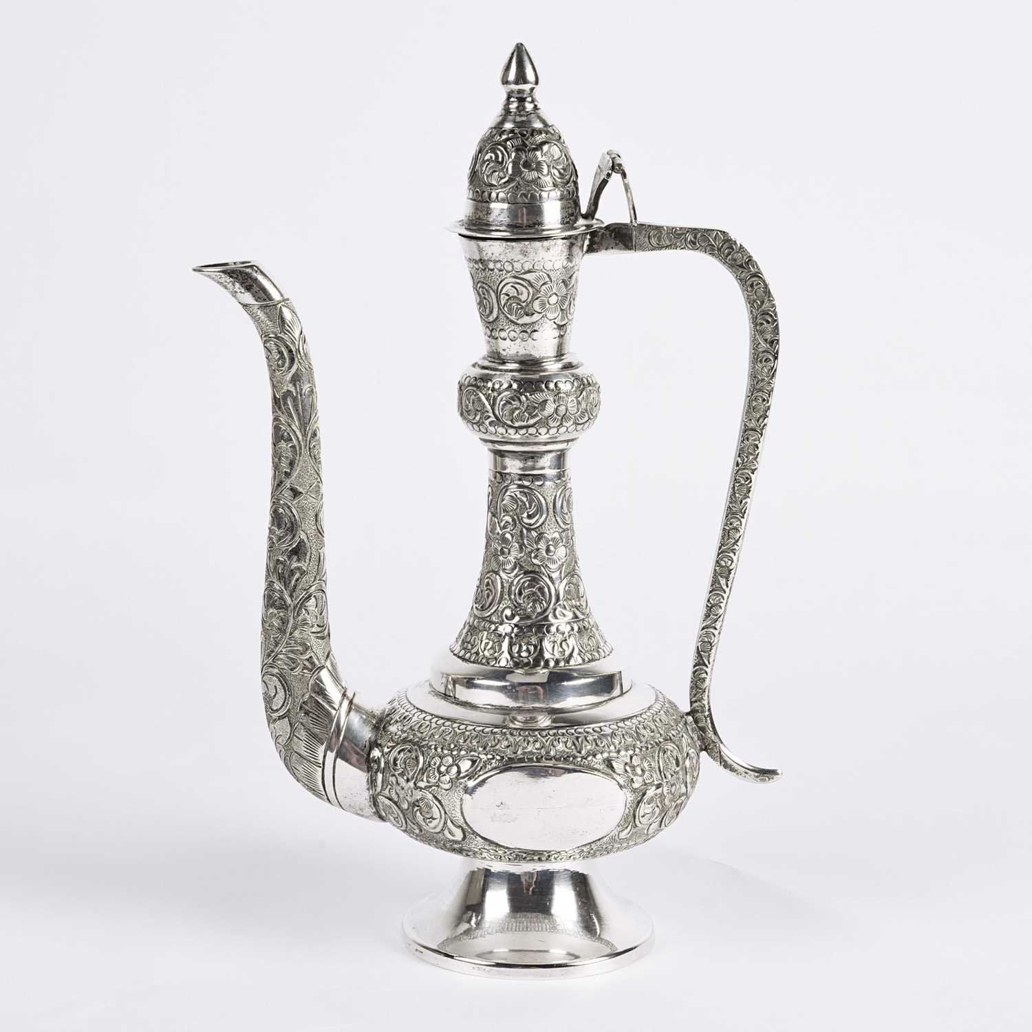 Lot 15 - Indian sterling silver ewer.