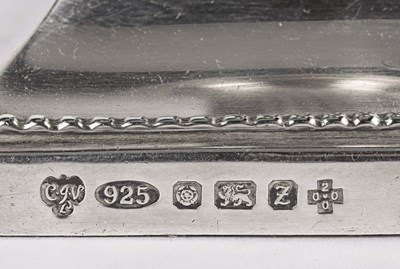 Lot 57 - British silver column candle holders.