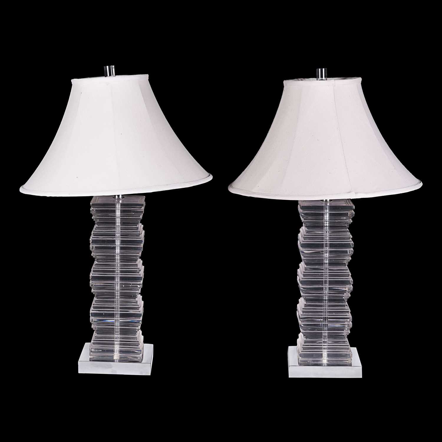 Lot 44 - A 1970s pair of large lucite and chrome table lamps.
