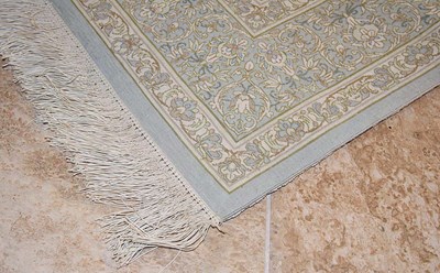 Lot 14 - Signed silk Qum carpet of saffron colors