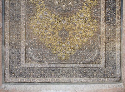 Lot 14 - Signed silk Qum carpet of saffron colors