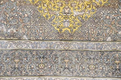 Lot 14 - Signed silk Qum carpet of saffron colors