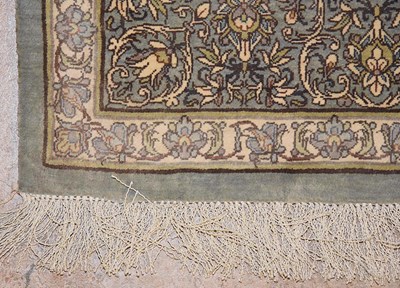 Lot 14 - Signed silk Qum carpet of saffron colors