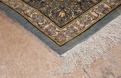 Lot 14 - Signed silk Qum carpet of saffron colors