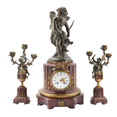 Lot 38 - French gilt and patinated bronze and marble figural mantel clock