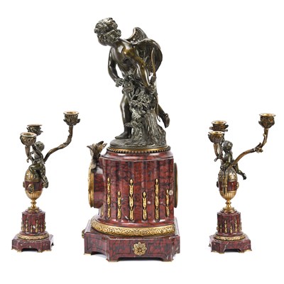 Lot 38 - French gilt and patinated bronze and marble figural mantel clock