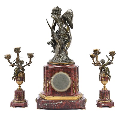 Lot 38 - French gilt and patinated bronze and marble figural mantel clock