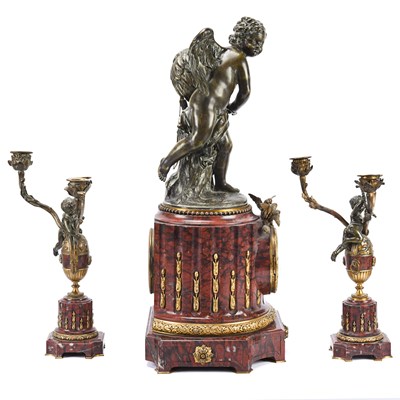 Lot 38 - French gilt and patinated bronze and marble figural mantel clock