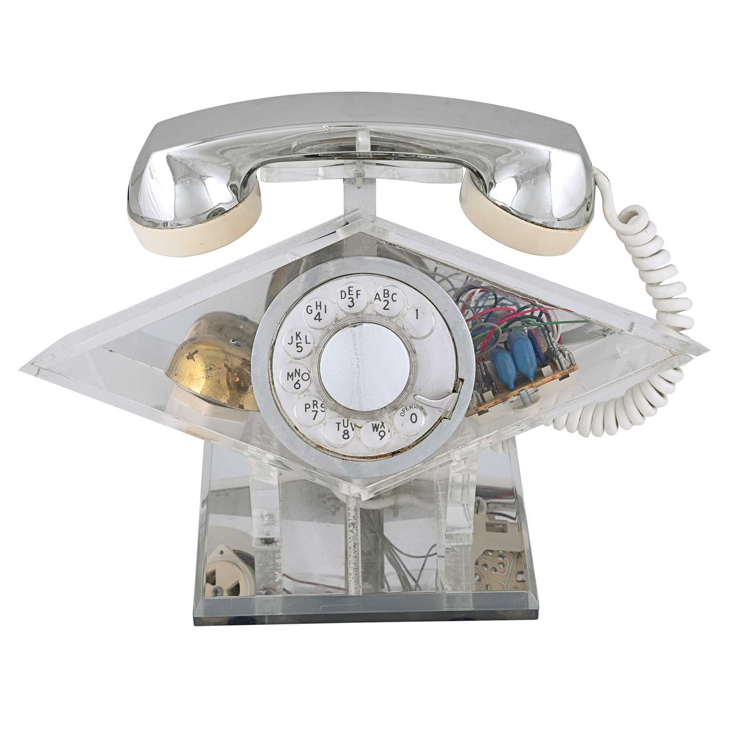 Lot 221 - Transparent 1970s space age lucite and chrome phone of diamond shape
