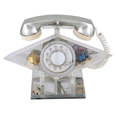 Lot 221 - Transparent 1970s space age lucite and chrome phone of diamond shape
