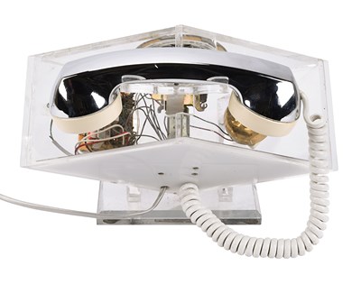 Lot 221 - Transparent 1970s space age lucite and chrome phone of diamond shape
