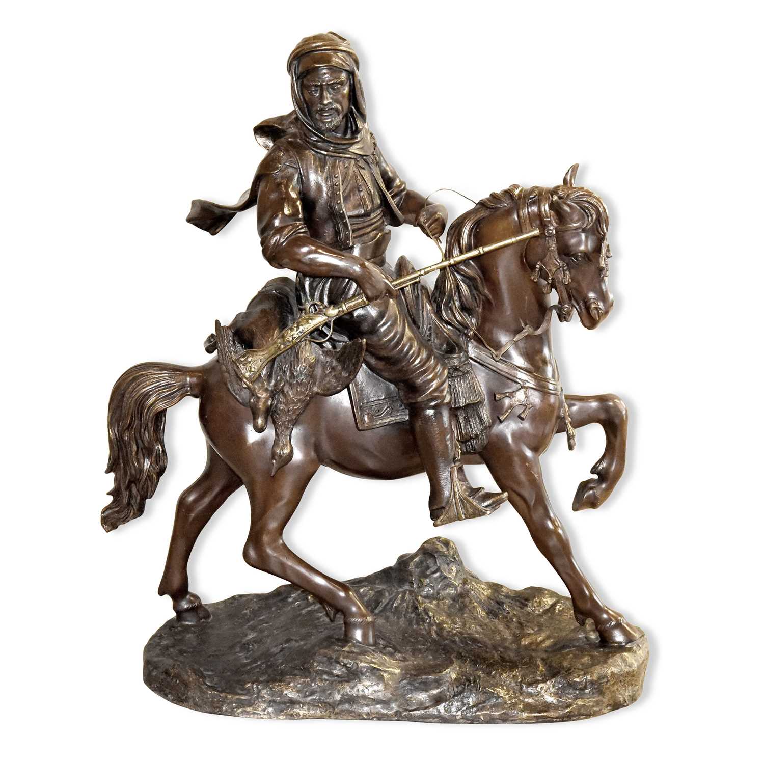 Lot 343 - Well-cast bronze Arab Cavalier " the man on horseback " standing on a rocky base