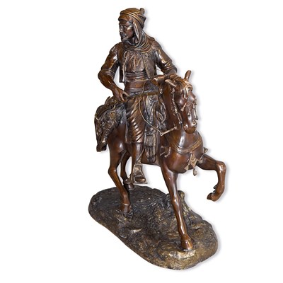 Lot 343 - Well-cast bronze Arab Cavalier " the man on horseback " standing on a rocky base