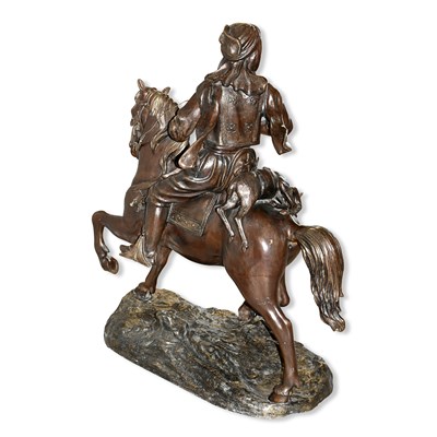 Lot 343 - Well-cast bronze Arab Cavalier " the man on horseback " standing on a rocky base