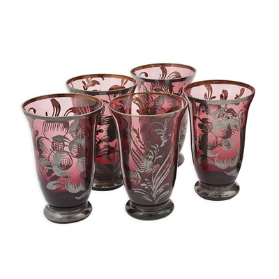 Red glass set with a pitcher and five tumblers.