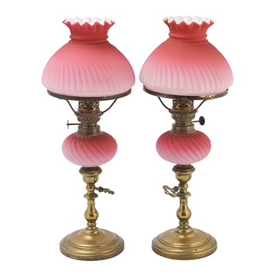 Late 19th century pair of Victorian pink glass oil lamps