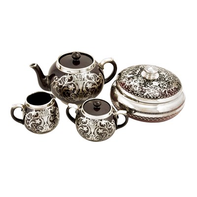 Silver-plated ceramic tea set and a silver-plated glass bowl