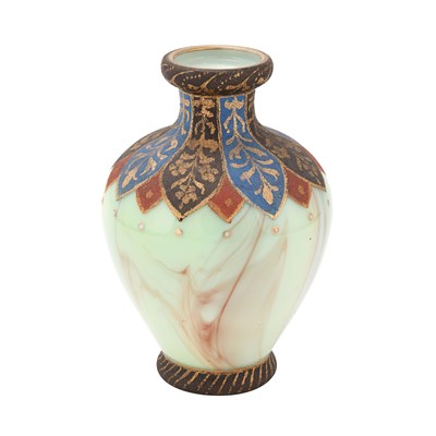 A marble and enamelled green glass vase