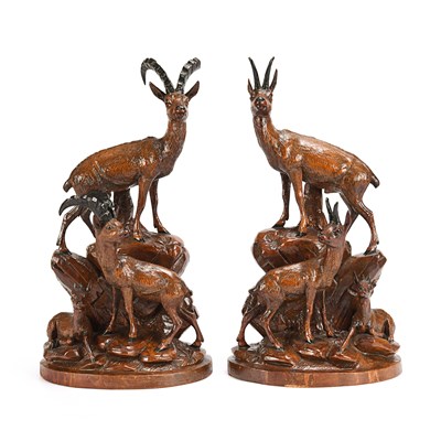 Sculptures depicting Ibex stood on Rocky Outcrops