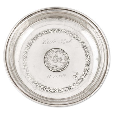 Circular silver dish with Ottoman silver coin